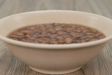 Hearty bowl of pinto beans to perfectly compliment any Mexican food meal