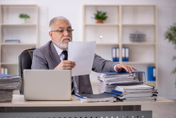 Old male employee and too much work in the office