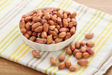 Raw peanut heap in the bowl