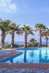 swimming pool on the Mediterranean coast in the recreation area of the Greek fishing village of Sissi