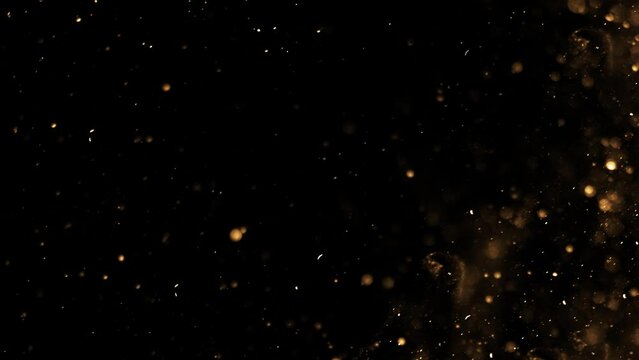 golden waves motion abstract of particles gold dust with stars on black background. wave background gold movement, seamless loop in 4k resolution.