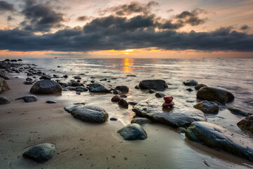 Rocky coastline of the Baltic Sea in Gdynia Orłowo at sunrise, Gdynia. Poland - obrazy, fototapety, plakaty