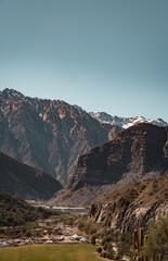 Obraz premium Vertical view of Cajón del Maipo with snow-capped mountains, Chile