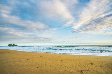 Sunrise at Playa Cocles, beautiful tropical Caribbean beach, Puerto Viejo, Costa Rica east coast and island Cocles