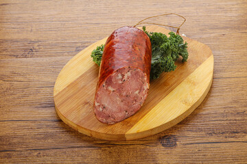 Pork ham sausage over board