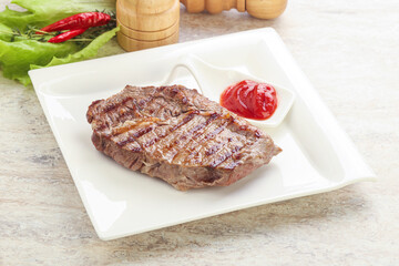 Grilled rib-eye steak beef meat