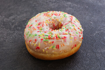Sweet glazed vanilla donut with icing