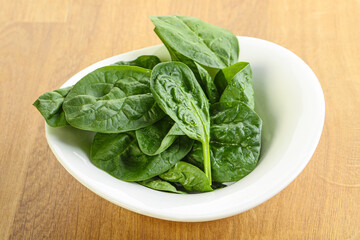 Fresh green spinach leaves in the bowl