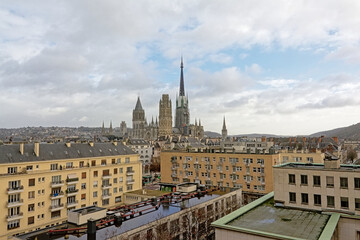Fototapeta premium Aerial view on the ornate gothic cathedral of Rouen and it`s surroundings on a cloudy day, Normandy, France 