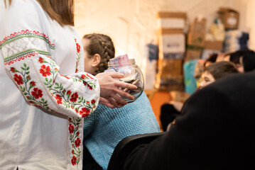 volunteer fundraiser vyshyvanka ukraine charity piggy bank