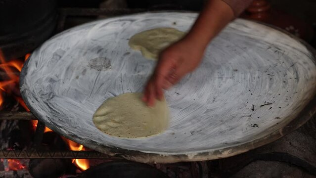 Making Traditional Corn Tortilla In Mexico