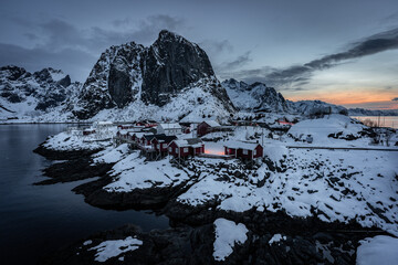 fisherman houses in the lake at sunrise winter