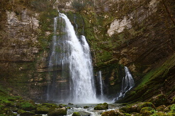 Fototapeta na wymiar View on the Flumen Waterfall just next to the city of Saint-Claude in the Jura department