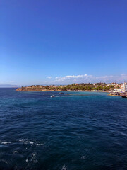 Fototapeta premium Summer Travel Vacation. View On Beautiful Beach On Greece Shore.