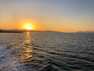 Golden Beautiful sunset at the seaside, Greece