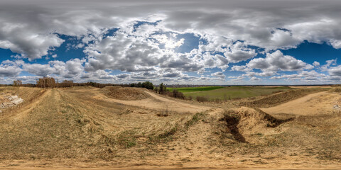 360 hdri panorama view on sand hill with sun with clouds in blue sky in full seamless equirectangular spherical projection, ready for VR AR virtual reality content