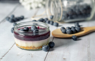 Tasty blueberry cheesecake with fresh sweet blueberries