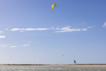 Picture of kitesurfers in stormy weather and sunshine in Florida