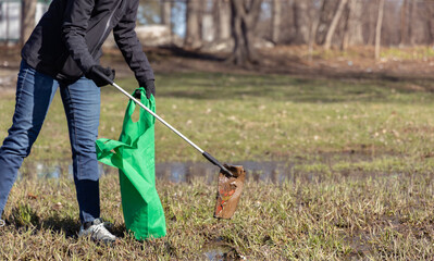Picking up garbage in a city park