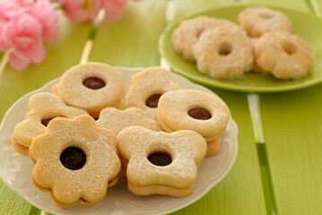 Sablé shortbread cookies on green table