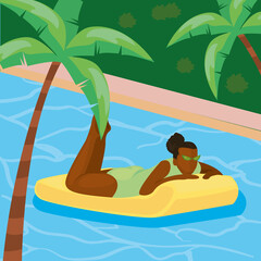 afro woman in pool with float