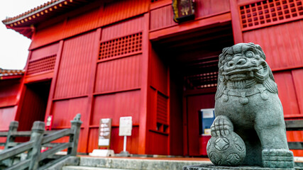 Lion statue at japanese temple shrine in okinawa japan religion travel adventure tropical island...