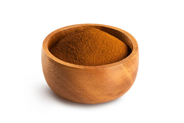 Instant coffee in wooden bowl on white background.