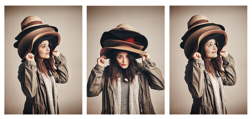 I gotta have the perfect hat before I head out. Composite shot of a young woman wearing a pile of...