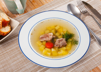 World famous light vegetable soup cooked in meat broth with slices of pork
