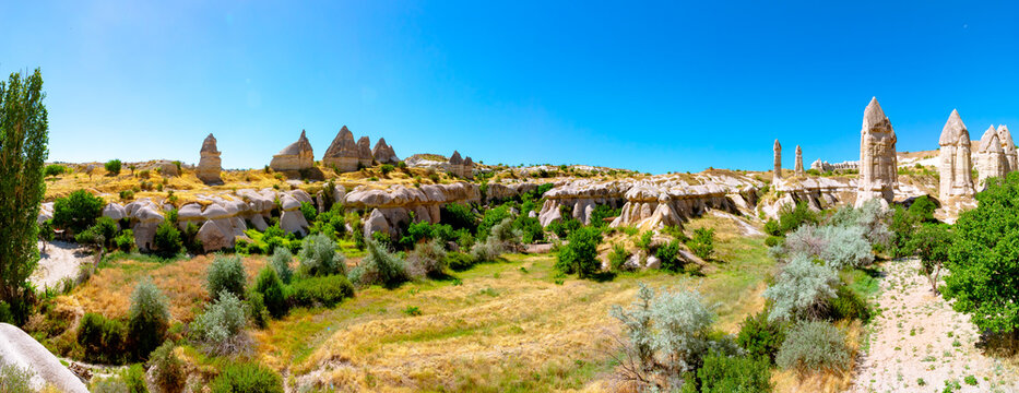 Panoramic view of Cappadocia in summer. Travel to Goreme background