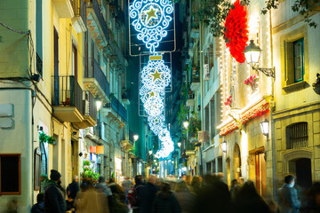 Photo of streets of Barcelona in evening during christmas time.