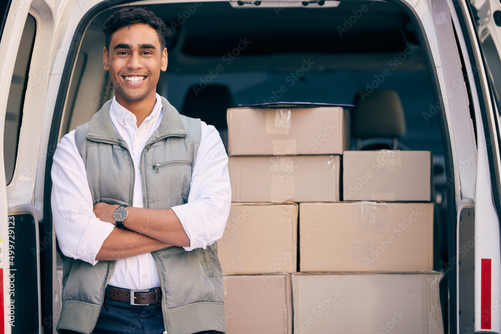 Poster i have quite a few deliveries today. shot of a delivery man standing with his arms crossed by a deli