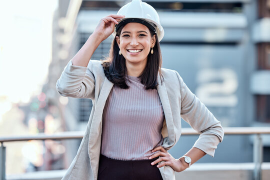 If you wear the hardhat then youre doing hard work. Shot of a young businesswoman wearing a hardhat while standing outside.