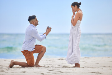 You make me the happiest Ive ever been. Shot of a young man proposing to his girlfriend on the...
