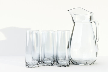 A decanter and a glass for milk, water or juice on a white isolated background. 3d illustration
