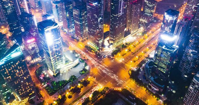 Aerial hyperlapse of Chengdu Cityscape at twilight  with buildings and traffic on the road