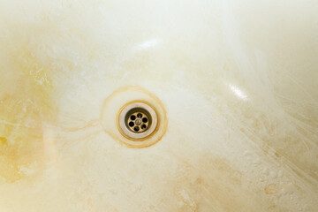 Dirty and rusty sink close-up. The concept of cleanliness and hygiene