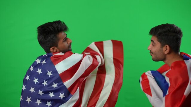 Middle Eastern football fans arguing as British team wins American talking at chromakey background. Young men cheering watching sport match on green screen. Competition concept