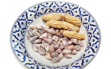 Peanut in ceramic plate on white background