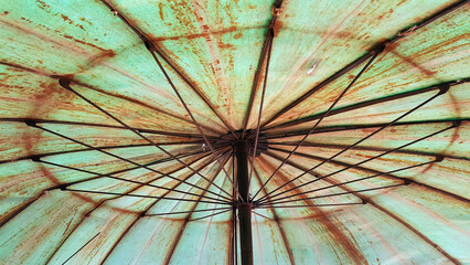 Bottom view of old umbrella
