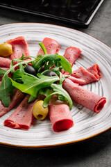 Dried meat slices appetizer platter