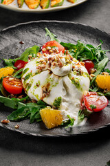 Portion of fresh gourmet burrata salad