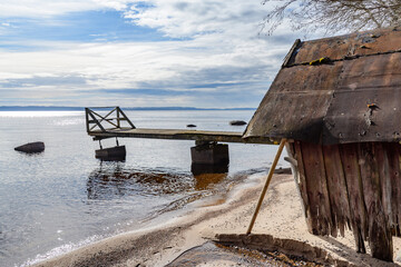 rotten boat house on lake vattern near habo in sweden