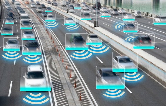 Autonomous Self Driving Cars Moving Through City.