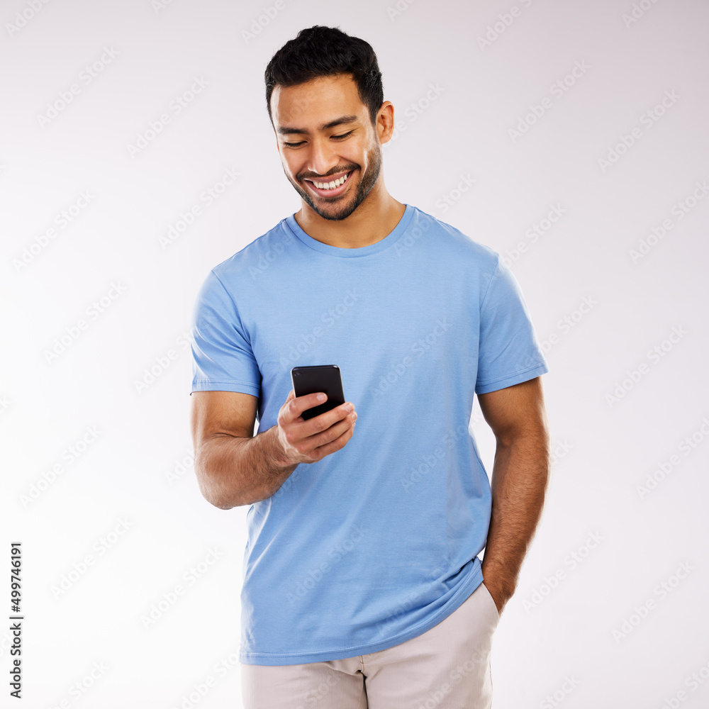 Poster a sweet text a day keeps sadness away. studio shot of a young man using a phone against a grey backg