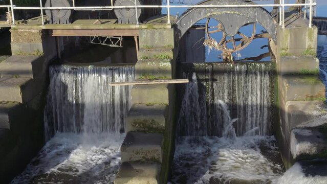 Close up shot of Castleford flower mill's old sluice gates. Yorkshire UK on a bright sunny spring day.