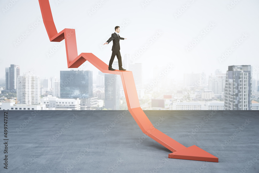 Poster young businessman balancing on abstract falling red arrow on light city background with mock up plac