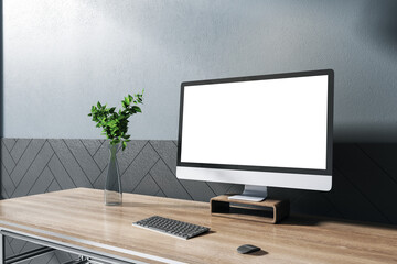 Modern designer wooden desktop with empty white computer screen, decorative plant, chair and concrete wall background. Mock up, 3D Rendering.
