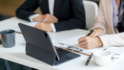 Team business people planning strategy brainstorming and analysis marketing and using laptop. Business meeting concept.