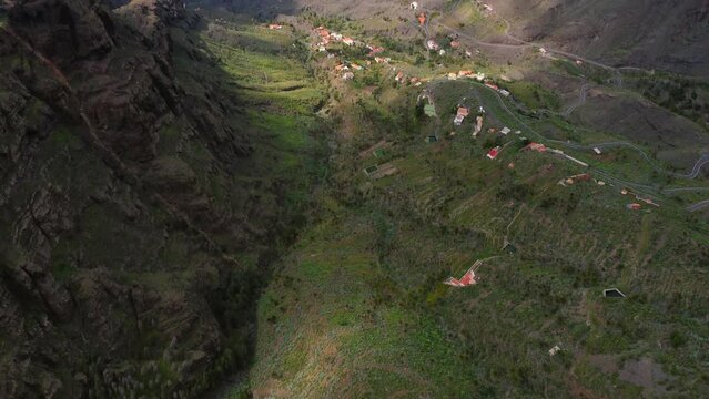 Scenic View Of Ocean And Town From Mirador Ermita del Santo, Scenic Spot In Spain. - aerial tilt up